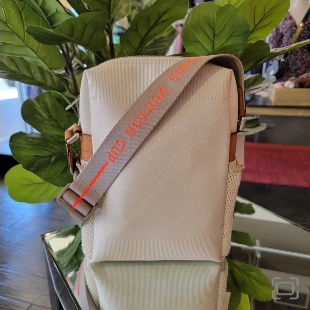 LOUIS VUITTON
Limited Edition LV Cup White Damier Geant Weatherly Bag